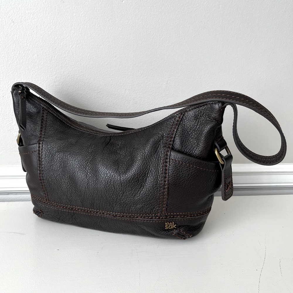 The Sak brown leather purse.